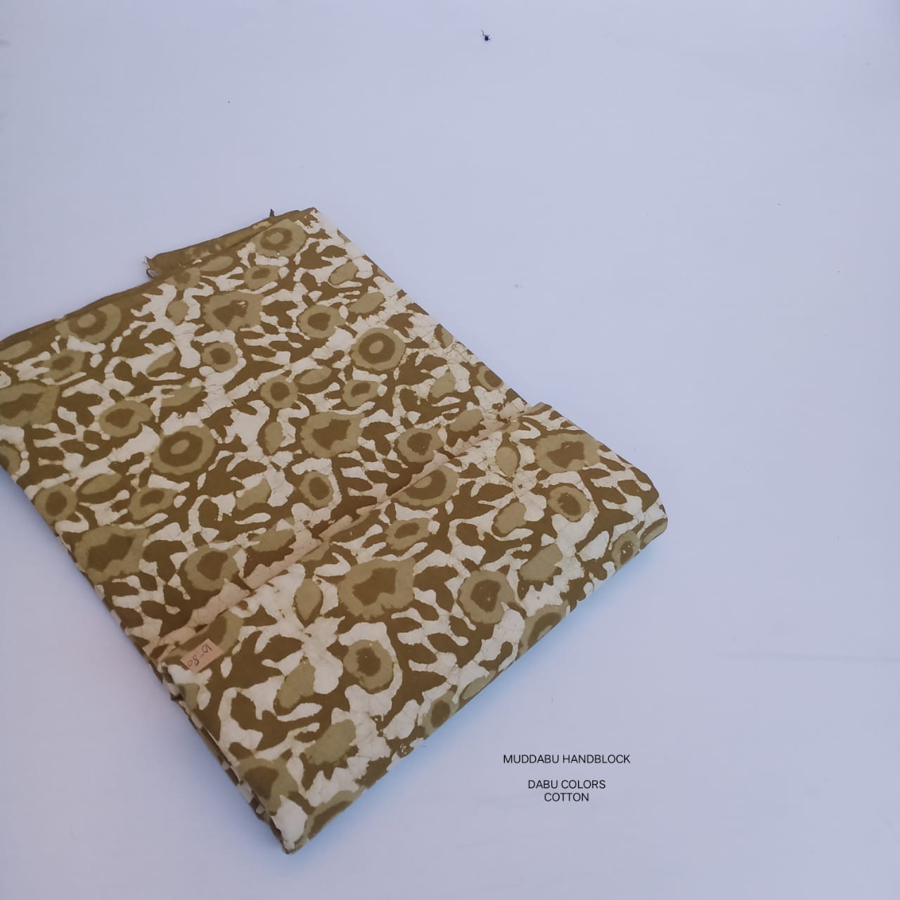 Mustard floral stem jaal Dabu handblock printed cotton fabric for wholesale buyers